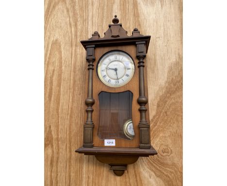 A KUNDO QUARTZ VIENNA STYLE WALL CLOCK 