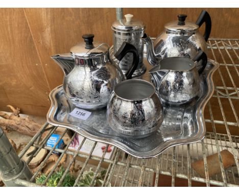 A SWAN BRAND TERA SERVICE TO INCLUDE TEAPOT, COFFEE POT, SUGAR BOWL AND MILK JUG ETC 