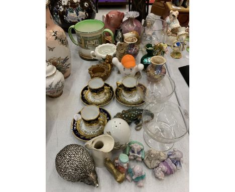 A MIXED LOT TO INCLUDE SMALL CUPS AND SAUCERS, ANIMAL FIGURES, GLASSWARE, A DOULTON MUG, ETC 