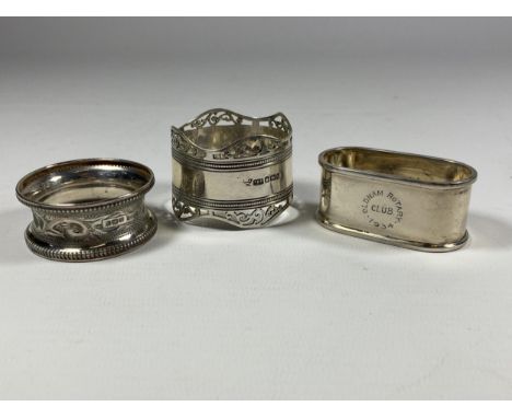 A GROUP OF THREE SILVER NAPKIN RINGS TO INCLUDE A OLDHAM ROTARY CLUB EXAMPLE, TOTAL WEIGHT 64G 