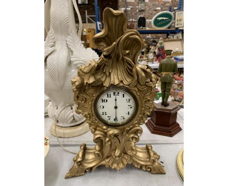 A ROCCOCO STYLE GOLD COLOURED MANTLE CLOCK HEIGHT 38CM 