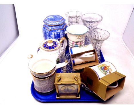 A tray containing lead crystal vases, a carriage clock, commemorative ware, Ringtons cathedral caddy.