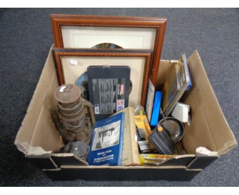A box containing precision tools, mini screwdrivers, tap and die set, vintage paraffin lamp, two ceramic plates in frames.