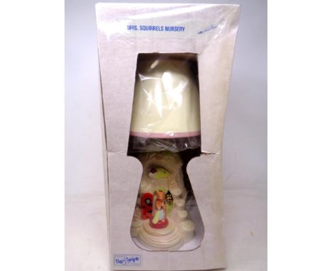 A 20th century Heritage hand painted Mist Squirrels nursery table lamp (in box as new).