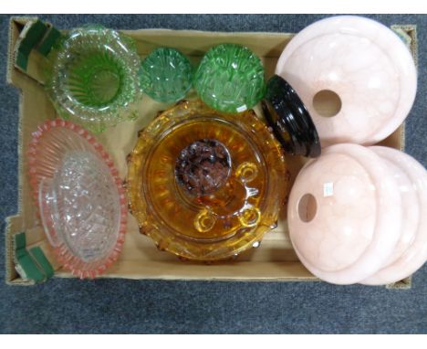A box containing a quantity of 20th century glassware including amber glass bowls, flower holders, glass light shades.