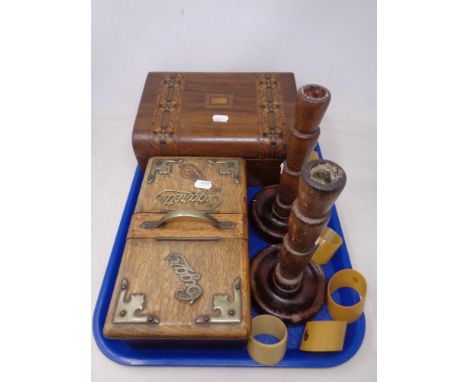 A tray containing an Edwardian oak cigar/cigarette box with mental mounts, a 19th century marquetry inlaid trinket box, a pai