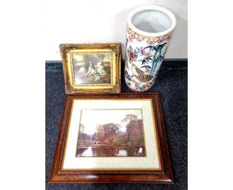 A Chinese style cylindrical stick pot together with a framed print of a spaniel with puppies in an ornate gilt frame and a fu