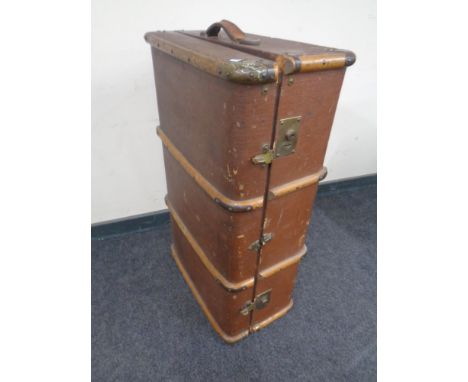 A wooden bound shipping trunk.