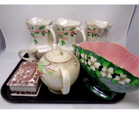 A tray containing seven pieces of Maling including teapot, lidded trinket pot, vases and jugs.