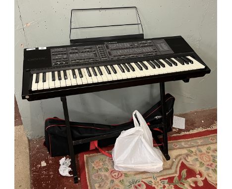 Technics SX-K700 PMC electronic keyboard together with stand, foot pedal, carry case and book