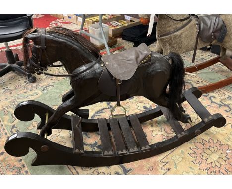 Child's carved wooden rocking horse 