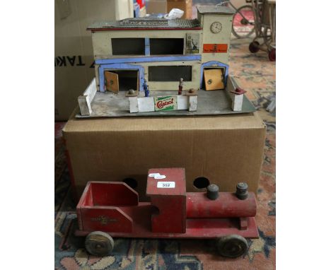 Vintage wooden toy car garage with wooden toy train 