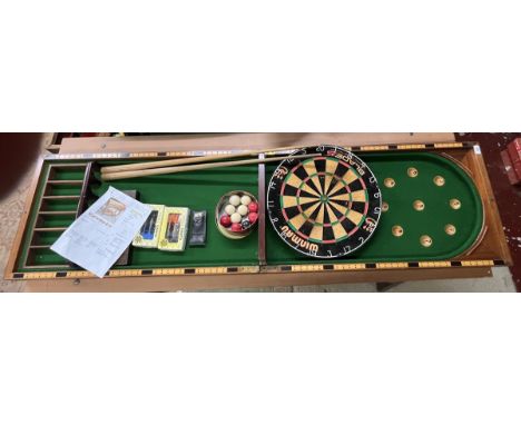 Collection of sporting equipment to include dartboard, bagatelle board etc