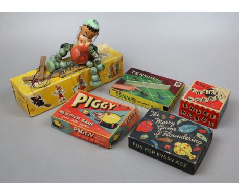 Collection of vintage toys including a Pelham puppet 