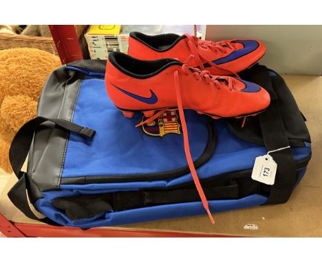 Barcelona FC backpack together with a pair of Nike football boots size 8 