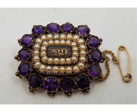 A 19th century precious yellow metal, amethyst and pearl set mourning brooch, having braided hair and yellow metal initials t
