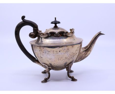 A Edward VII Bachler's teapot with pierced gallery, raised on hoof feet, approx 11oz, Birmingham 1902