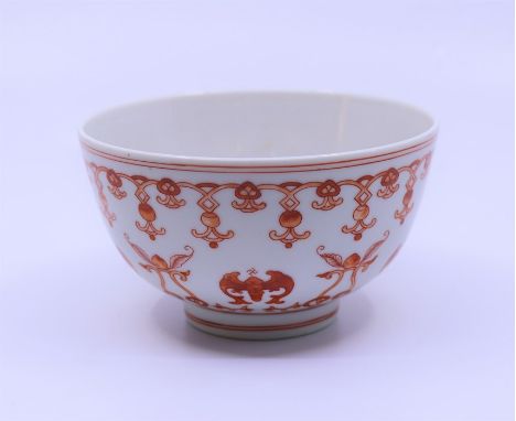 A Chinese porcelain bowl decorated in fine enamel decoration with knots and bats , bearing Qianlong mark&nbsp;