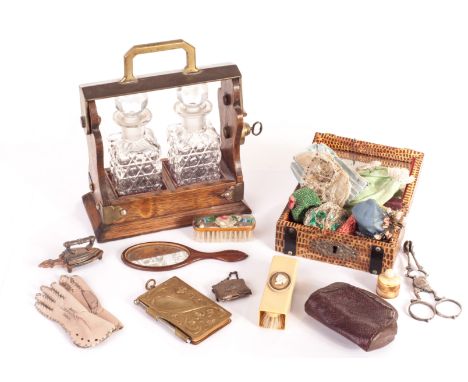 Doll’s accessories: comprising a Tantalus with two decanters - 6 1/2in (17cm) high; a wooden hand mirror; a small trunk; a br