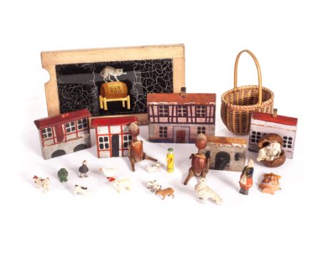Various toys: including five semi-dimensional Erzgerbirge buildings; wooden miniature lady, sheep, pig, dog, seagull; a minia