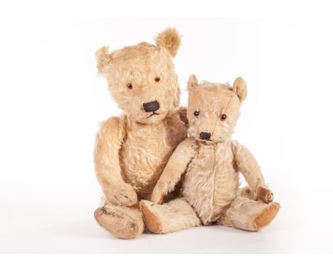 A Chiltern type Teddy Bear, 1930s, with pale golden mohair, orange and black glass eyes, pronounced muzzle, black stitched no