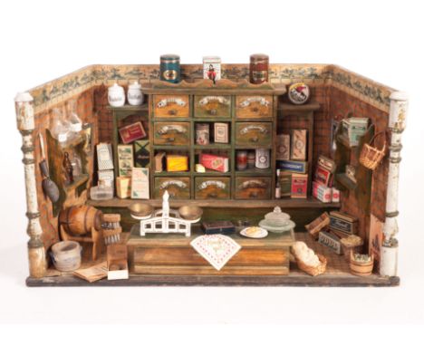 A German toy shop for the German market, early 20th century, the three sided room with paper covered walls and floor, the bac