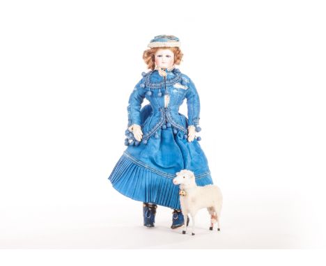 A French small Fashionable doll, circa 1880, with poured bisque shoulder head, hand cut slender dark blue eyes, feathered bro