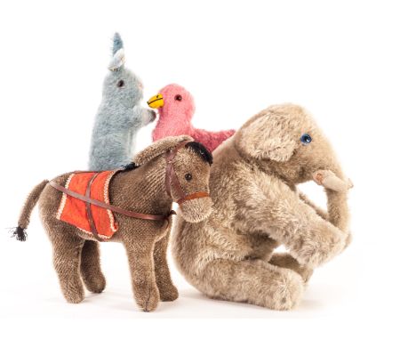 A Chad Valley grey mohair elephant, 1930s, with blue glass eyes, white felt tusks, inoperative squeaker and red and white lab