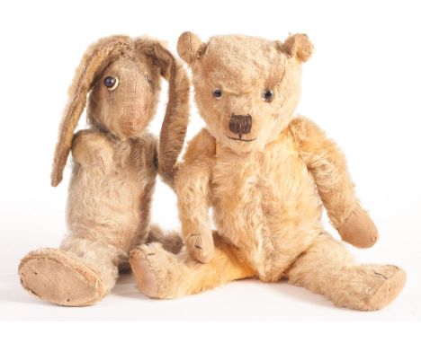 A Chiltern type Teddy Bear, 1930s, with golden mohair, replaced clear and black glass eyes, pronounced muzzle, black stitched