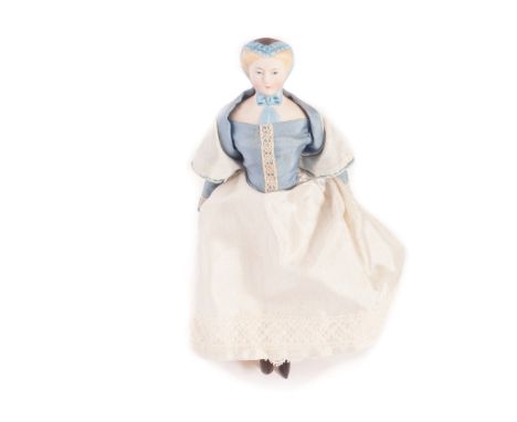 An unusual German bisque shoulder-head dolls’ house doll with moulded lace cap, with blue painted eyes, moulded blonde hair s