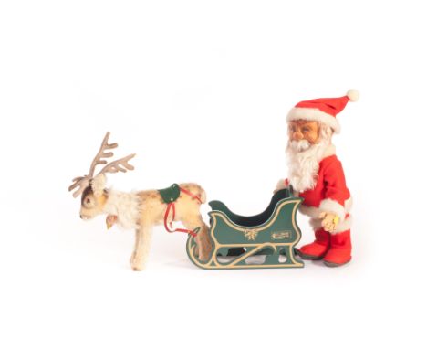 A rare Steiff post-war Father Christmas/Santa Claus, with rubber face, mohair beard, jointed felt body with original clothes 