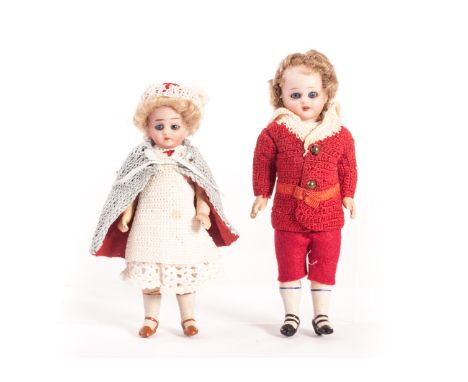 Two bisque headed dolls’ house dolls, a boy with blue sleeping eyes, red crochet and felt outfit with matching hat; and a gir