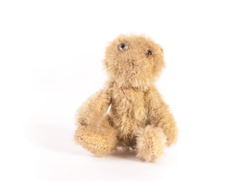 A Farnell ‘soldier’ Teddy Bear, circa 1918, with blonde mohair, clear and black glass eyes, pipe-cleaner ears, swivel head, p