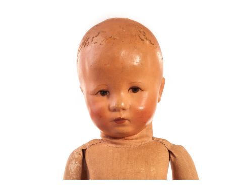 A Käthe Kruse Doll XII H, The Child of Fortune, with painted brown eyes, cloth hinge jointed body, string attached to stiffen
