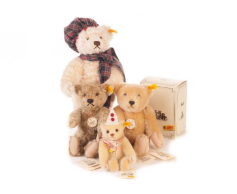 Modern Steiff yellow tagged Teddy Bears: a Danbury Mint Winter Bear - 14in (35.5cm) high; a 1951 Classic; a 1920 Classic; and