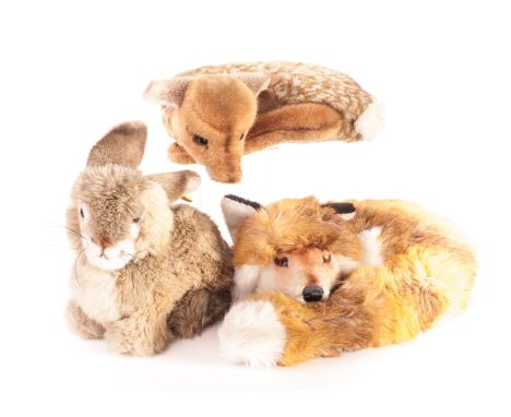 Four modern Steiff animals: acrylic/cotton plush comprising sleeping fox - 13in (33cm) wide; a sleeping fawn; and two rabbits