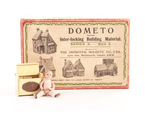 Dolls’ house items and Dometo building blocks: a German all bisque dolls’ house doll - 3 1/2in (9cm) high (damage to three li