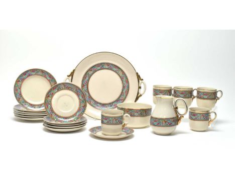 A Belleek part tea service, 1920's, each piece with celtic band border in orange, green, yellow and blue, comprising: five cu