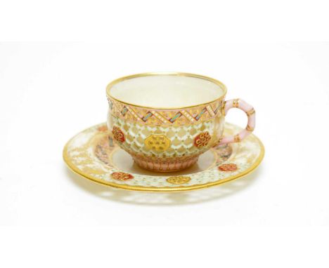 A fine Royal Worcester cabinet cup and saucer, 1890, reticulated in the manner of George Owen, and finely gilded probably by 