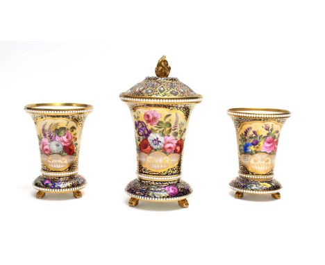 A Garniture of three Spode pattern 2575 spill vases, circa 1820, each well decorated with panels of summer flowers, and flowe