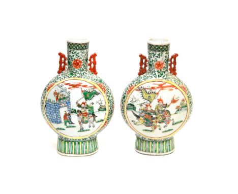 A pair of Chinese famille verte moon flasks, 19th century, decorated with warriors on horseback, and figures entering a fortr