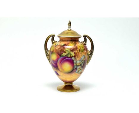 A Royal Worcester fruit painted vase and cover, signed T Nutt, decorated with peaches, grapes, blackberries and apples, doubl