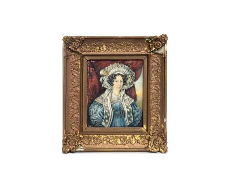 19th Century British SchoolPortrait of a Lady in Decadent 1830s Fashion,watercolour with gilt highlights,15 x 12.5cms, in fra