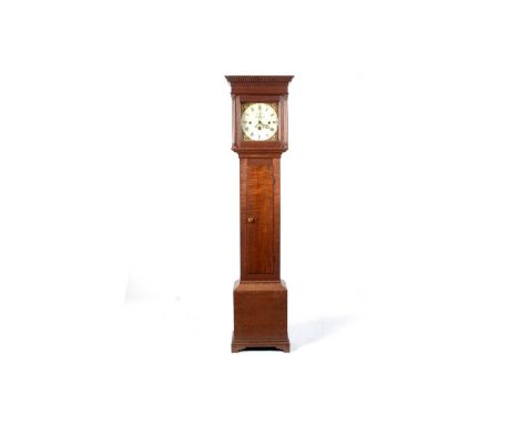 W Packer, Buckingham, an oak musical longcase clock, the painted roman dial, with leaf spandrels and date aperture, three tra
