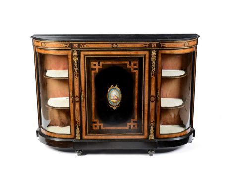 A 19th Century ebonized walnut marquetry breakfront credenza, the flared top above central inlaid panel door with Sevres-styl