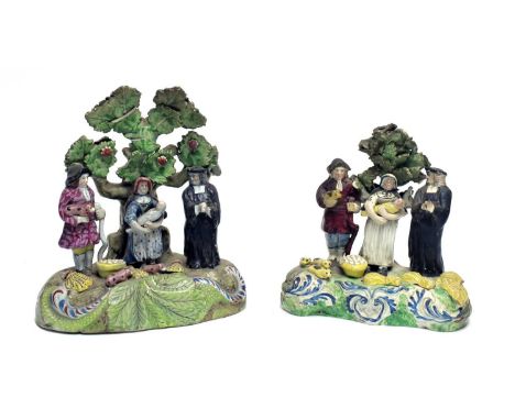 A Staffordshire pearlware Tythe Pig group, 19th century, depicting the farmer holding a pig, the farmer's wife with swaddled 