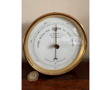 BRASS CASED HOLOSTERIC BAROMETER, J BROWN, 76 VINCENT ST, GLASGOW, DIAMETER APPROX 12.25cm AND DEPTH APPROX 5.5cm

 