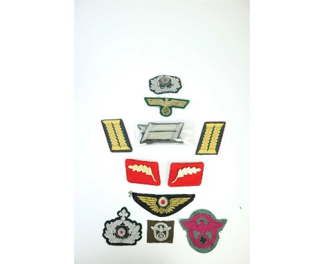A selection of German WW2 and later cloth insignia including a pair of Indanturrat Army Administration shoulder tabs, possibl