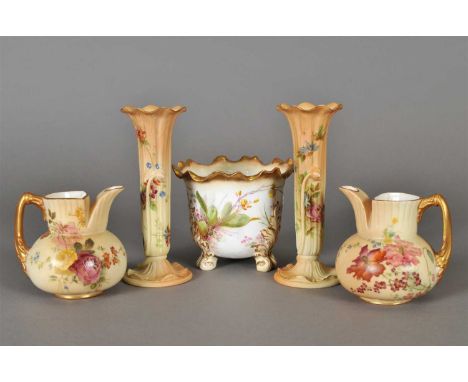 Four pieces of Royal Worcester blush ivory painted with flowers, early 20th century, comprising a pair of slender trumpet vas