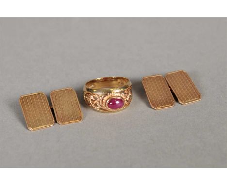 A 9ct Cloagau gold and ruby ring, the cabochon oval ruby collet set to pierced decorative mount, ring size M 1/2, together wi